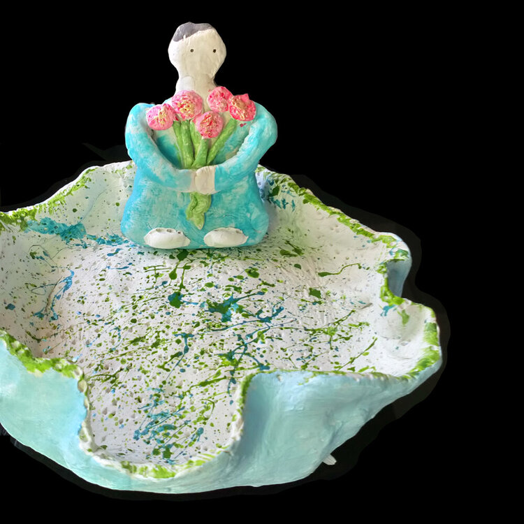 A sculpture created by Room for Art participant Christine using air-dry clay and acrylics. It was submitted as part of our Connecting to Nature project